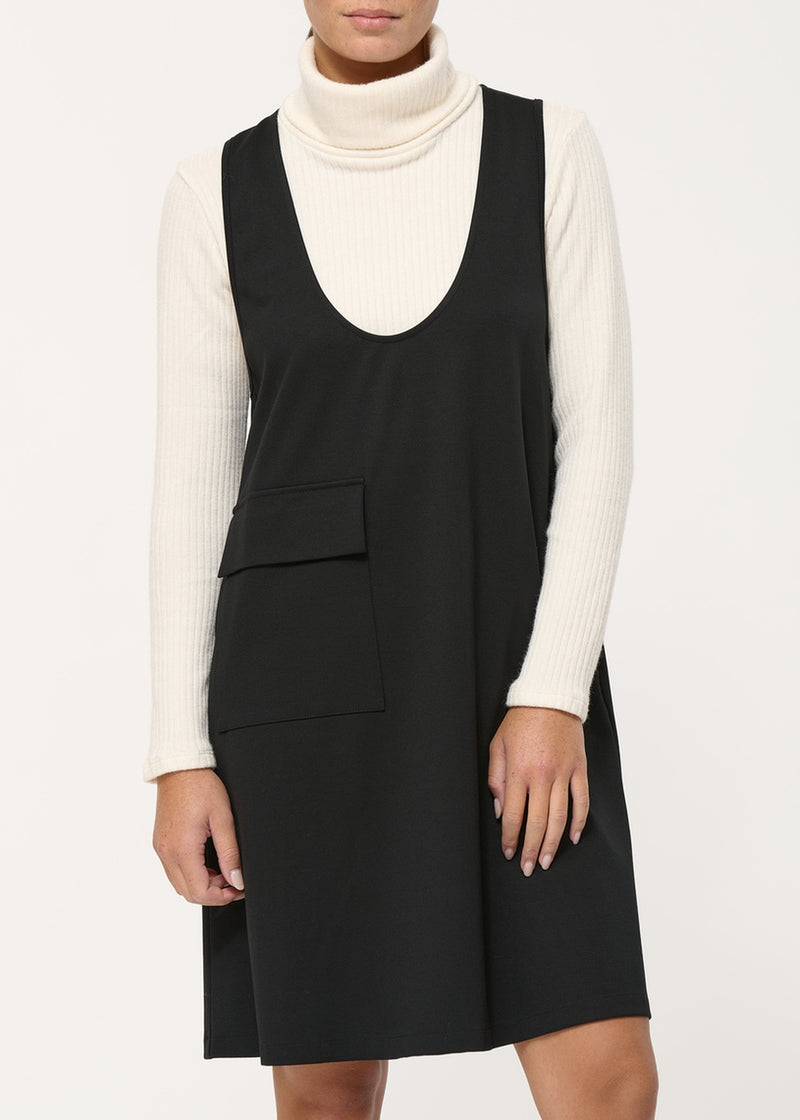 Black short pinafore dress with a scooped neckline